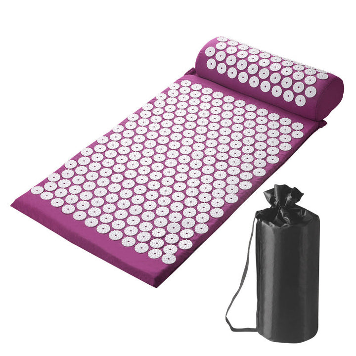 Purple acupressure mat and pillow set with white massage points, including portable black carrying bag, displayed on a white background for pain relief and relaxation.
