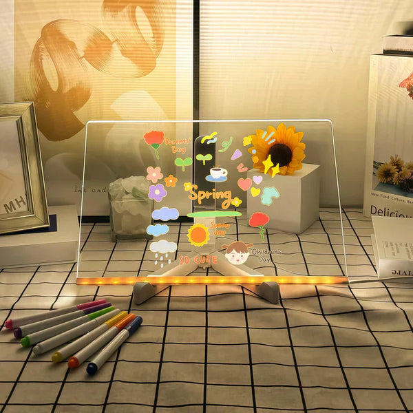 Glowing kids drawing board with spring-themed doodles and colorful markers for creative learning and fun art activities.